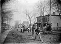 Making Macadam Road in front of J.B.'s house, O.E. [Ottawa East] 1 April 1910.
