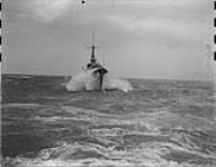 H.M.C.S. HURON in rough seas, en route to Amsterdam 10 Ot. 1950