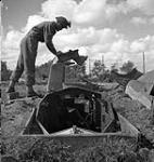 A German armoured car dug into the ground and used as a pillbox fortification, Nieuport, Belgium, 9 September 1944 September 9, 1944.