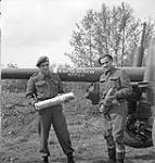 Gunner Gerry Smith and Lance-Bombardier Bert Coughtry of the 5th Medium Regiment, Royal Canadian Artillery (R.C.A.), Otterloo, Netherlands, 5 May 1945 May 5, 1945.