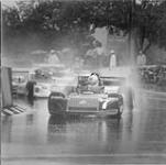 Bill Brack applies power in the rain at Corner Two 1978