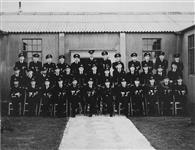 Group photo of officer flying personnel of the Royal Navy and Royal Canadian Navy. Lt. R.O. de Nevers is 6th from left in rear row. Other names are on the original photograph Nov. 1947