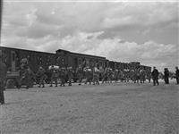 Canadian troops from various services embarking on train for return to England and eventual repatriation to Canada 31 May 1945