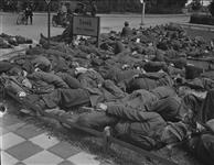 German soldiers being repatriated to Papenburg in Germany, resting at the entrance to town 28 May 1945