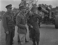 General Sun of the Chinese Army with Brigadier Mann, Lieutenant Colonel Baldwin and Lieutenant Colonel Dove inspecting German heavy guns 12 June 1945
