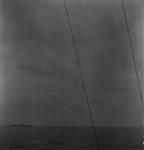 Planes of the British Pacific Fleet in formation towards H.M.C.S. UGANDA Apr. 1945