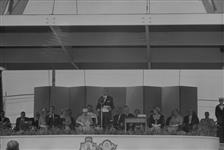 (Royal Visit) View of official party at opening of the St. Lawrence Seaway; unidentified speaker seen at microphone 26 June 1959