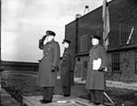 Air Vice-Marshal Leigh F. Stevenson, Air Officer Commanding Western Air Command, taking the salute at a parade, No.5 Operational Training Unit (Royal Canadian Airforce Schools and Training Units), Royal Canadian Air Force, Boundary Bay, British Columbia, Canada, 16 February 1944 February 16, 1944.