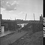 Bridge demolished by retreating German troops 28 Sept. 1944