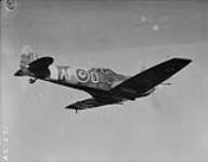 Spitfire 5 aircraft, in flight low 3/4 rear starboard view n.d.