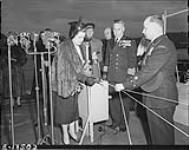 Ceremony of the recommissioning of H.M.C.S. QUEBEC, Esquimalt, British Columbia, 14 January 1952 14 Jan. 1952
