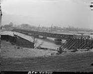View of the East approach spans of the Royal Canadian Engineers' bailey bridge 'Quebec' over River Maas. Ravenstein, Netherlands, 1 Feb. 1945 1 FEB. 1945