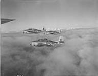 Avenger aircraft with new marking in V formation, near Royal Canadian Naval Air Station 28 Ot. 1952