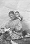 Inuit woman [Ada Ohokak] and child [George Atkot Ohokak] 1949-1950