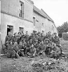 "Up The Glens": non-cmmisssioned officers toasting the fourth anniversary of The Stormont, Dundas and Glengarry Highlanders, Vieux Cairon, France, 20 June 1944 June 20, 1944.