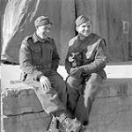 Private Kenneth E. White and Sergeant Norman C. Quick of the Canadian Army Film and Photo Unit, Ortona, Italy, 6 February 1944 February 6, 1944.