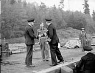 Vice Admiral Percy W. Nelles, Chief of Naval Staff, visiting the Royal Canadian Navy Port War Signal Station at York Island, British Columbia, Canada, 25 October 1942 October 25, 1942.