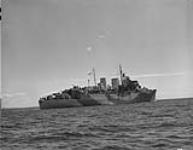 Starboard stern three-quarters view of HMCS PRINCE ROBERT after coversion to auxiliary A/A 16 June 1943