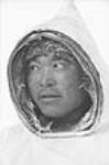 Inuit man in a parka, Inukjuak (formerly Port Harrison), Quebec 1947-1948.
