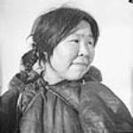 Inuit woman [Qaqiuq from Arctic Bay.  Her children in Hall Beach are Aula and Akpalialuk.] s.d.