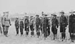 Brigadier-General E.A. Cruikshank reviewing a group of cadets, possibly Boy Scouts 1915