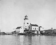 Lighthouse, lightkeeper's residence, and other buildings Jan. 1902