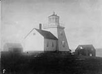 Lighthouse tower, lightkeeper's residence, and outbuildings 1890
