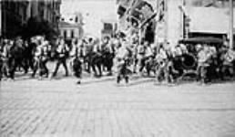 Greek soldiers marching through the streets 1916