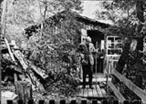 F.R. Scott at shed near cottage 1975