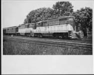 Toronto, Hamilton & Buffalo passenger train shows diesels locomotives # 401 and 403 1950's