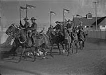 Royal Canadian Mounted Police (R.C.M.P.) on exercises at headquarters, Regina, Sask. [graphic material] 1933