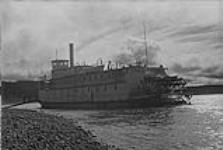 Paddle steamer 'Distributor' of the Hudson Bay Co. on the Mackenzie River [graphic material] 1933