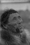 [Dehcho First Nations man smoking a pipe, N.W.T.] [graphic material] 1933
