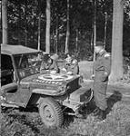 Personnel of the British Columbia Regiment with a jeep, near Brasschaet, Belgium, 14 October 1944 14-Oct-44