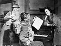 Cast members taking part in a CBC radio broadcast of The Army Show 21 Jan. 1944