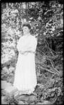 Unidentified woman in woods ca. 1907