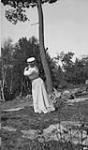 Unidentified woman golfing, Craigie Lea, Muskoka Lakes ca. 1907