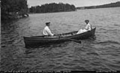 Unidentified couple in rowboat at Elgin House, Muskoka Lakes ca. 1908