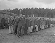2nd Canadian Corps. Demobilization of high ranking Nazi officers and officials in internment camp. View of German officers after removal of their uniforms 8 June 1945