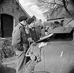 Brigadier R.W. Moncel (left) and Major-General Christopher Vokes, General Officer Commanding 4th Canadian Armoured Division,observing a German counter-attack, Sogel, Germany, 10 April 1945 April 10, 1945.