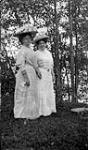 Two unidentified women in woods ca. 1908