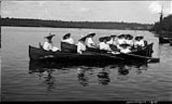 Unidentified group of women in rowboats ca. 1908