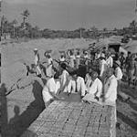 Foundations for the Institute of Practical Technology being built at Katubedde. L-R:Lionel Roy, Canadian High Commissioner's office; J. Samarasekera, Deputy Chief Architect; A.T.Sarawanamutoo, Superintending Engineer; A.J.E.G. Gaspersz, contractor 1956