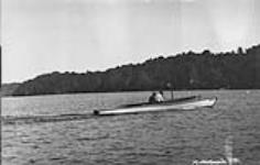 Two unidentified men in boat "Blue Streak" ca. 1909