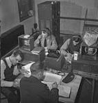 R.C.A.F. signals personnel operating radios May 1943