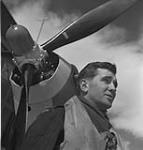 Unidentified pilot with Hawker 'Hurricane' XII aircraft of No.129 Squadron, R.C.A.F May 1943
