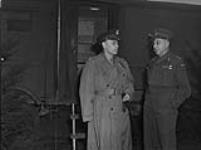 1st CANADIAN ARMY IN HOLLAND. Lt.Gen. Beedle-Smith, U.S. Army Chief of Staff at SHAEF with Gen. H.D.G. Crerar at Army Headquarters 11 Mar. 1945