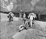 Dr. Norman Bethune with Chinese during an excursion (from a copy negative) ca. 1938-1939