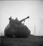 Sherman tank and crew at dawn 25-Jul-44