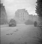 Tank moving into battle behind a smoke screen 11 July. 1944